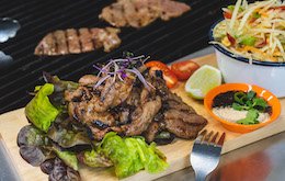 BBQ pork with papaya salad